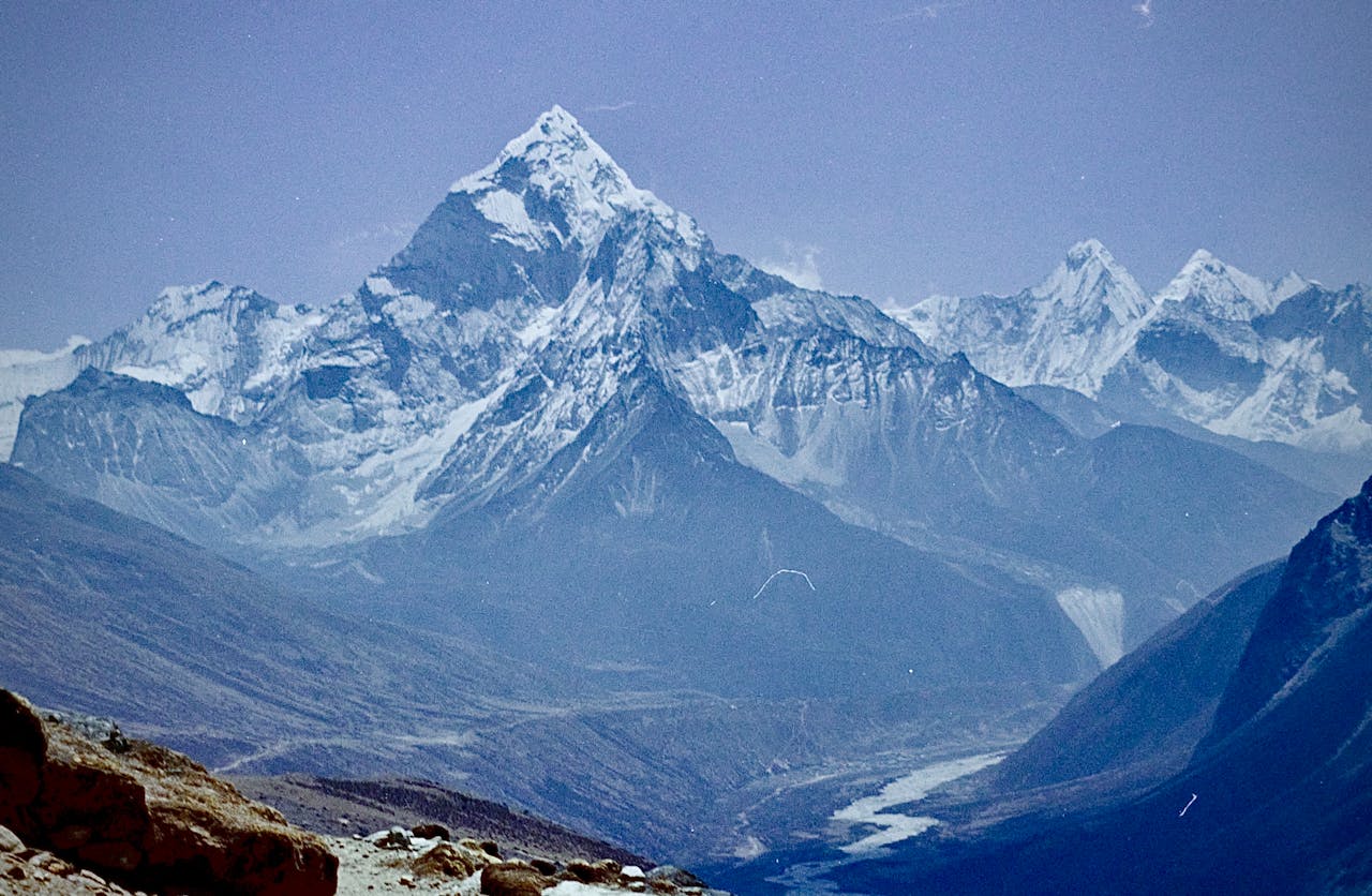 Stunning view of snow-capped Himalayan mountains under a clear blue sky.